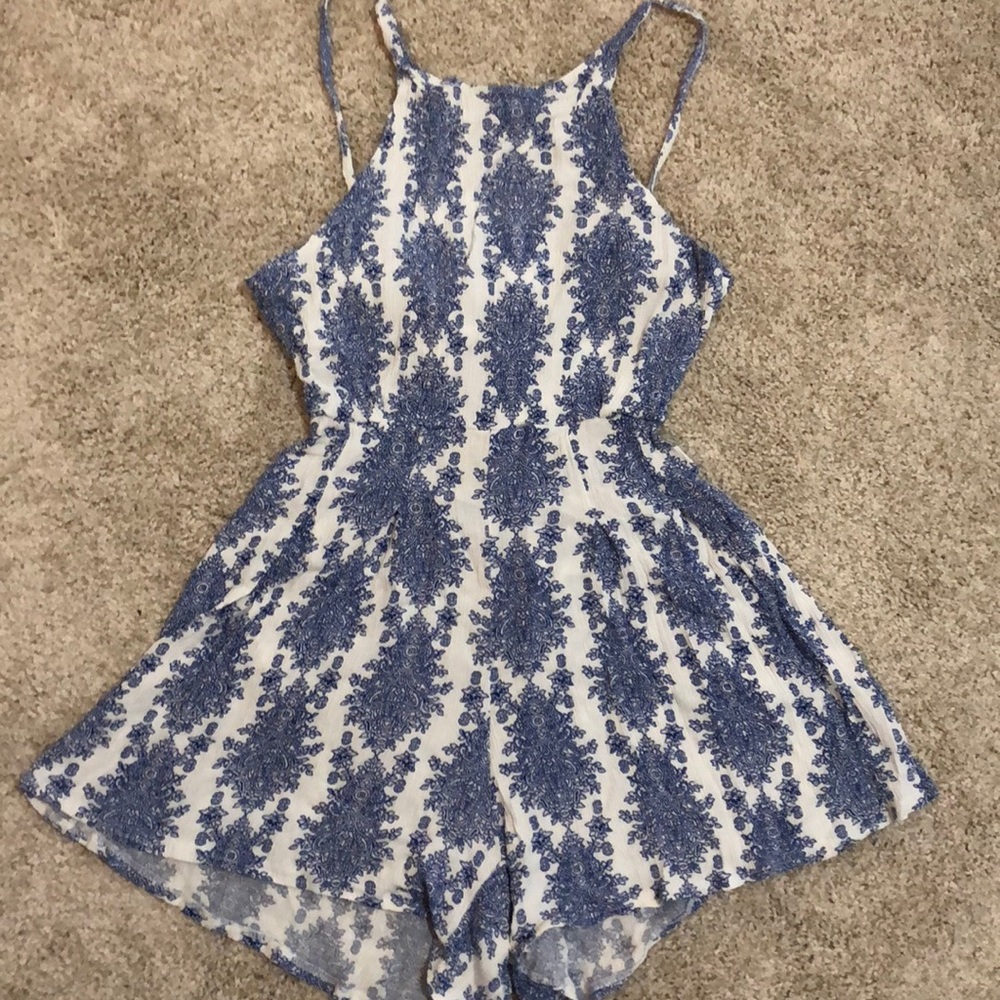 blue and white pattern romper